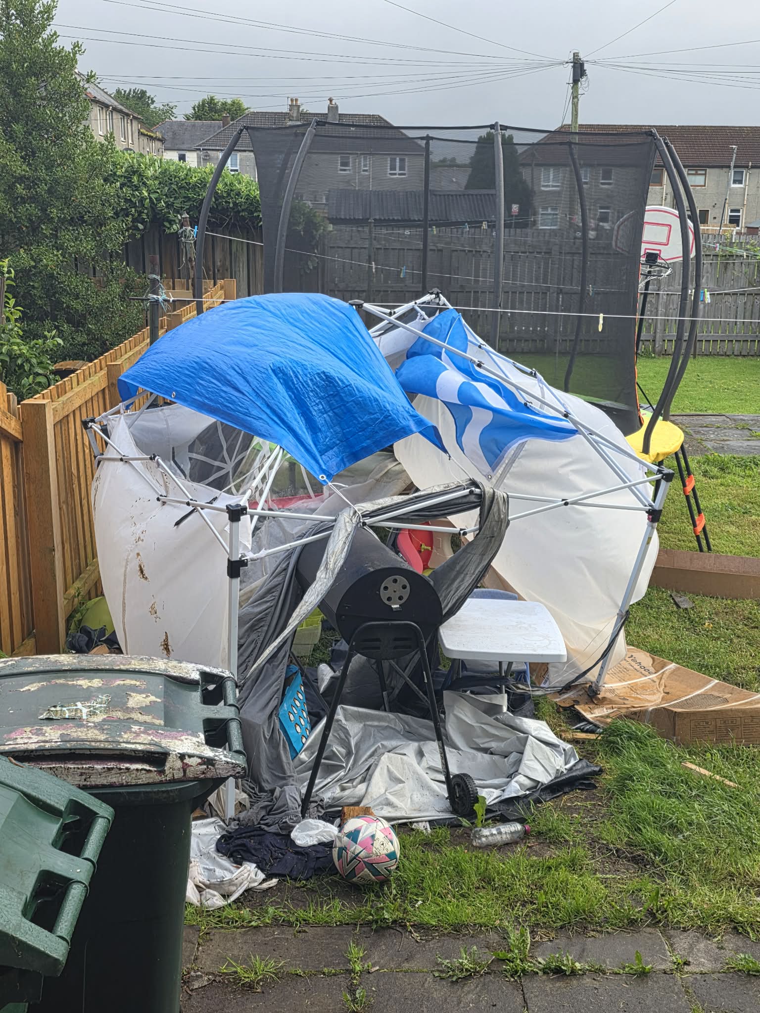 Damaged workshop gazebo after storm